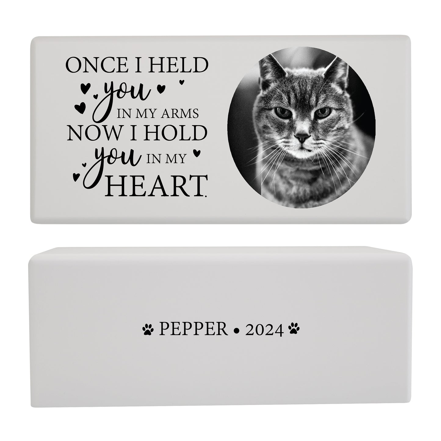 A white pet cremation urn featuring a cat photo and a touching memorial quote.