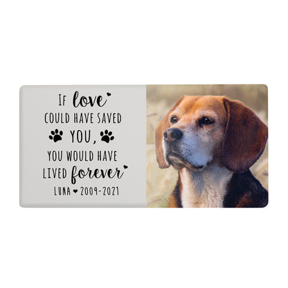 A white wooden pet urn for a pet with paw prints design and a heartfelt quote.