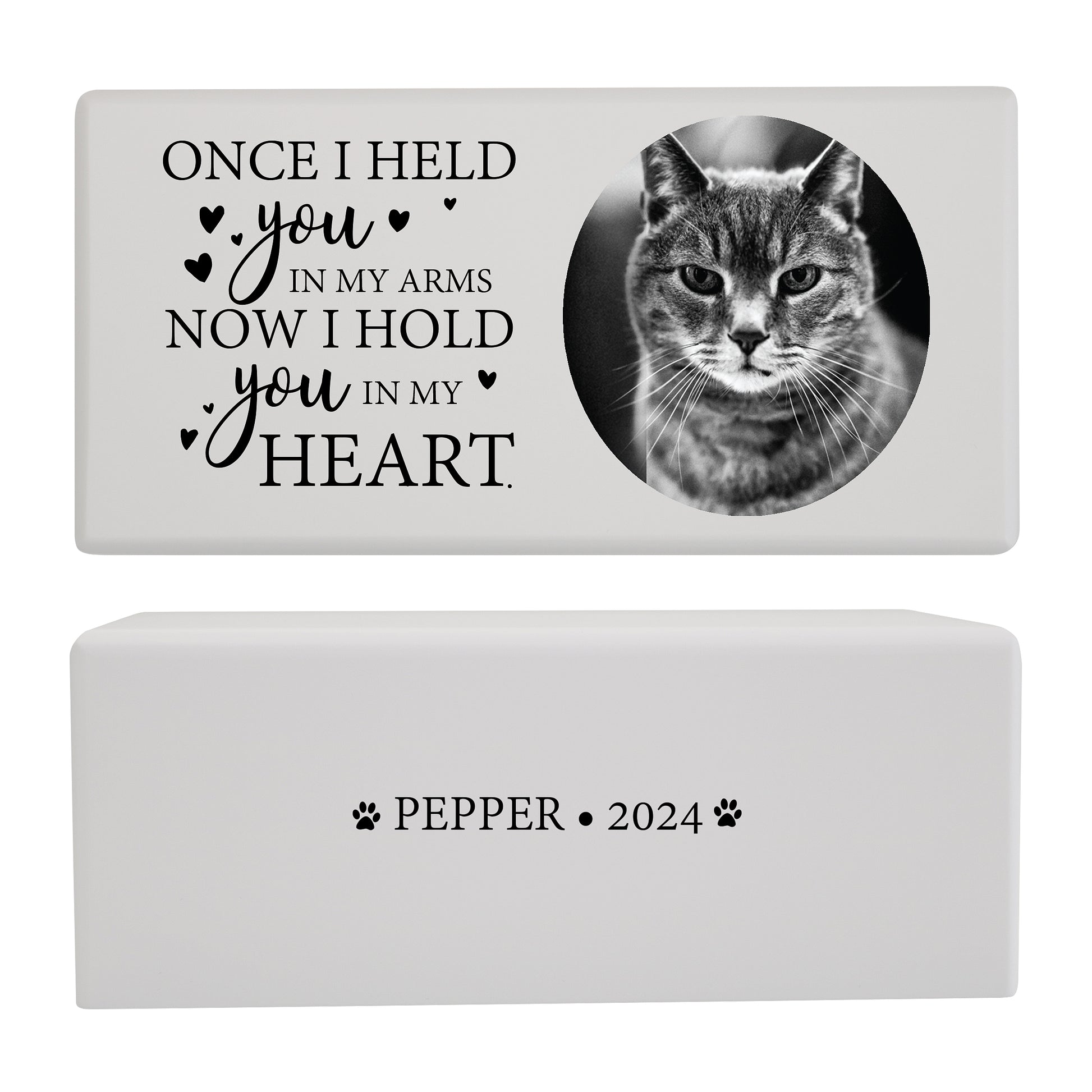 A white pet cremation urn featuring a cat photo and a touching memorial quote.